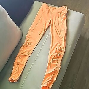 Free People Movement Light Orange Leggings New without tag